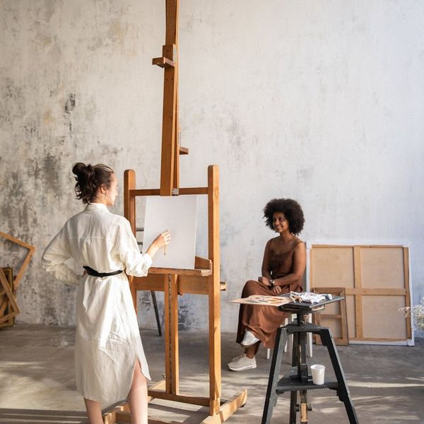 Diverse people feeling balanced inside a bright studio with azure light.